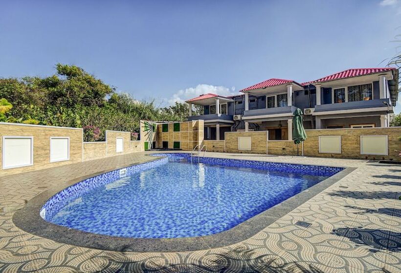 Отель Treebo Jp Cottage