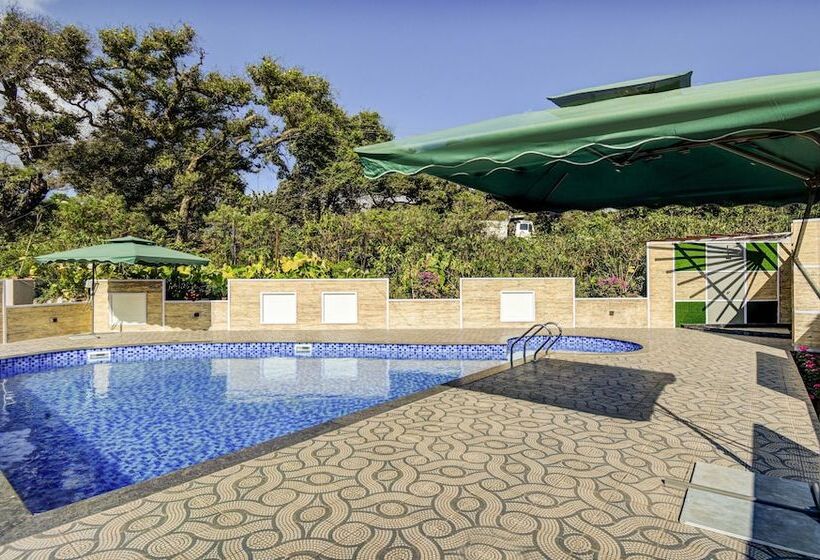 Отель Treebo Jp Cottage