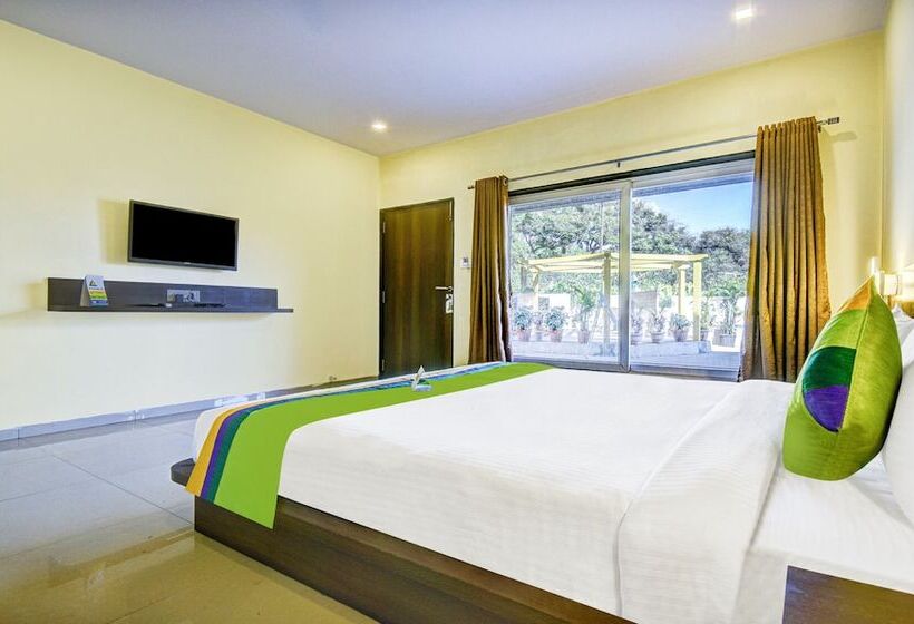 Отель Treebo Jp Cottage