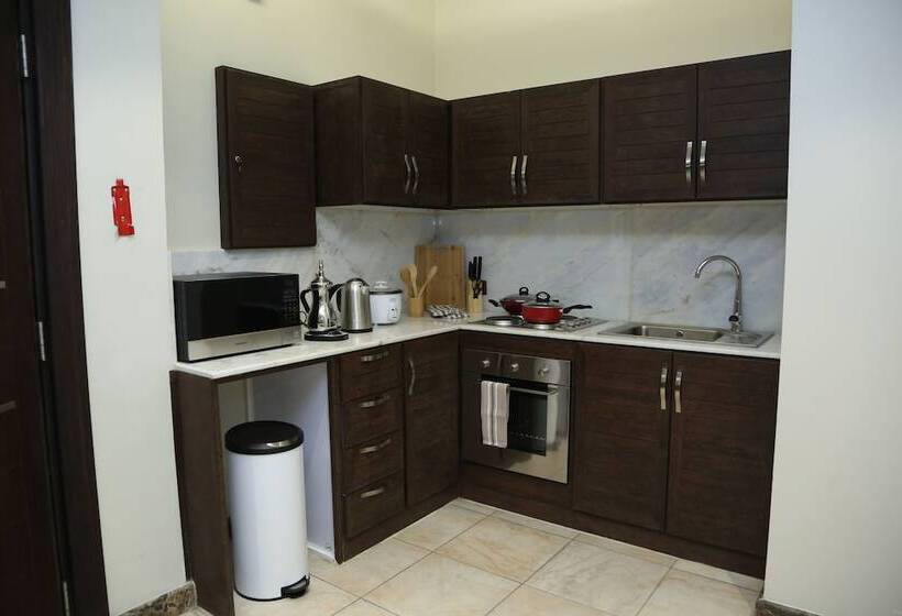 Отель Bayat Suites