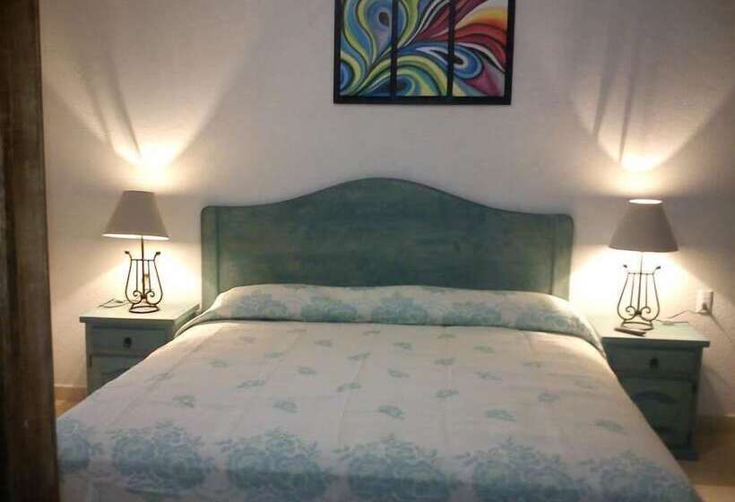 فندق Posada Y Bungalows La Capilla