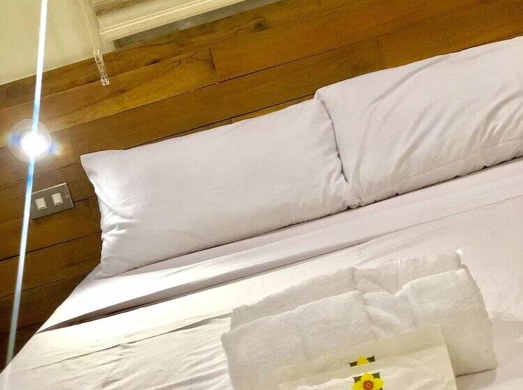 ホテル Two Seasons Executive Suites