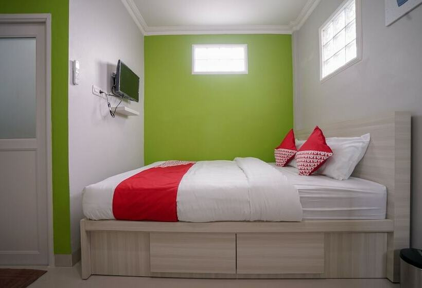 Отель Oyo 948 Vivi Residence Syariah Ii