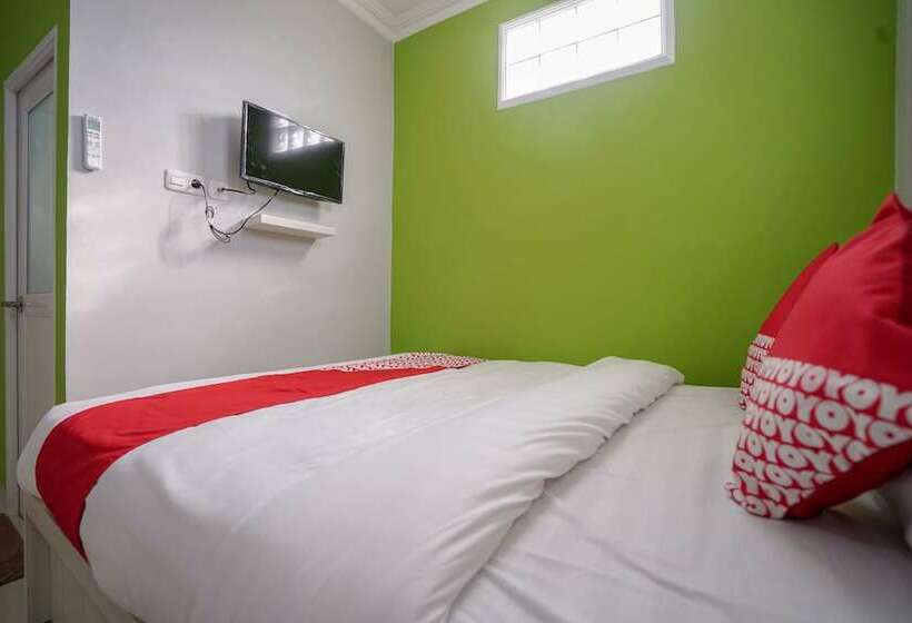Отель Oyo 948 Vivi Residence Syariah Ii