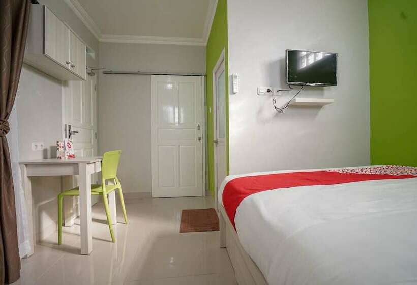 Отель Oyo 948 Vivi Residence Syariah Ii