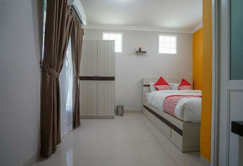 Отель Oyo 948 Vivi Residence Syariah Ii