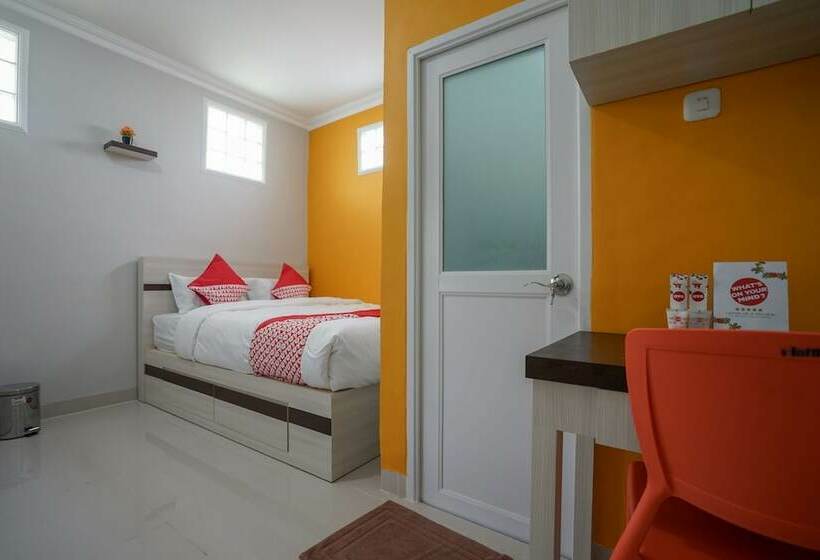 Отель Oyo 948 Vivi Residence Syariah Ii