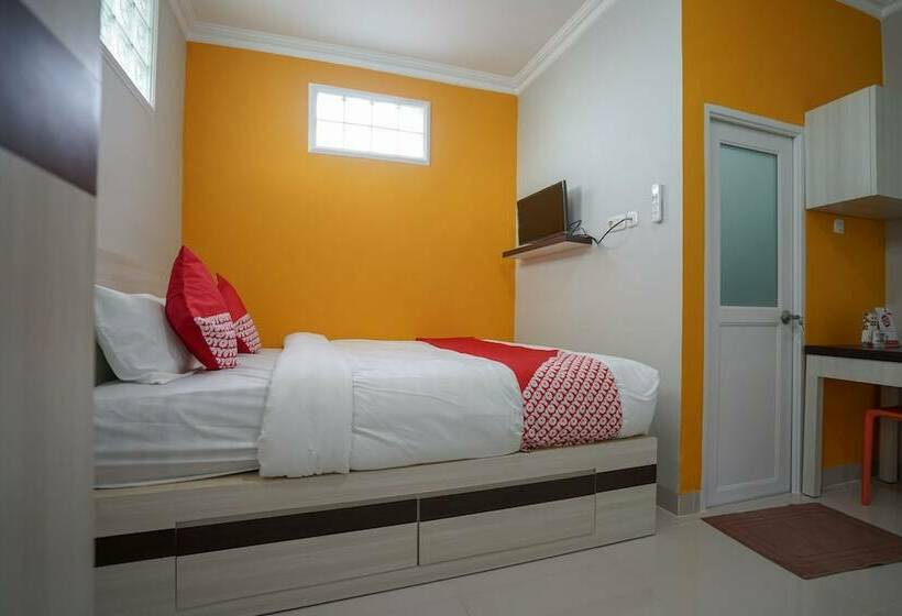 Отель Oyo 948 Vivi Residence Syariah Ii