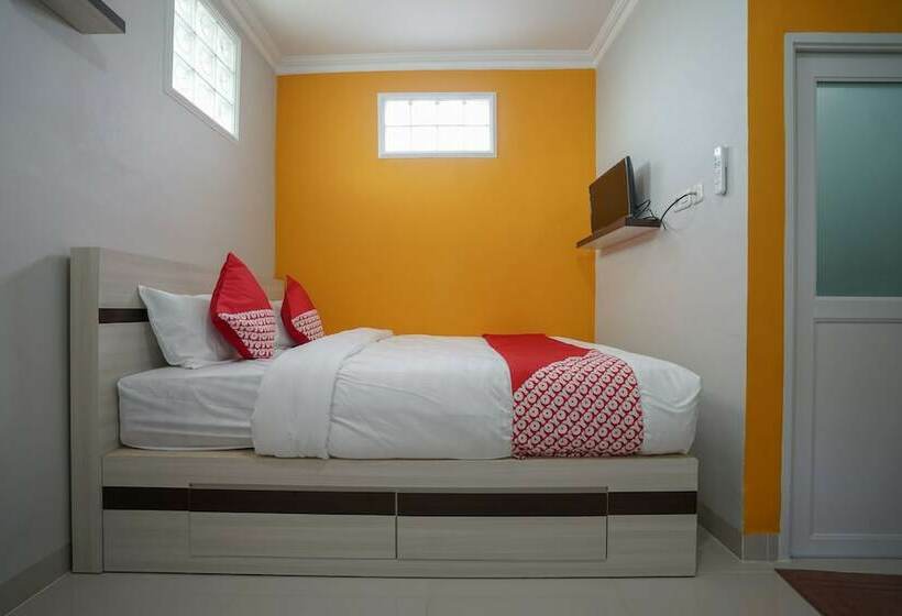 Отель Oyo 948 Vivi Residence Syariah Ii