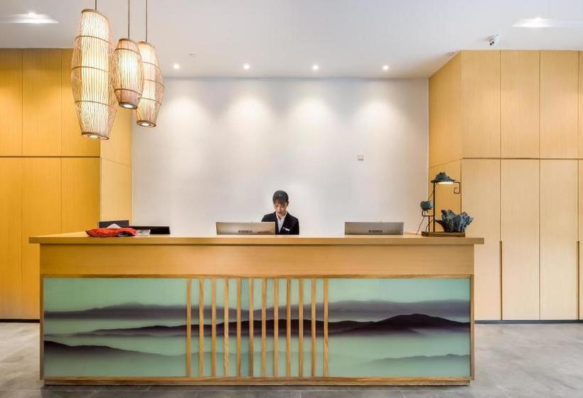 Отель Poltton Service Apartment Yangshuo Wubu Town