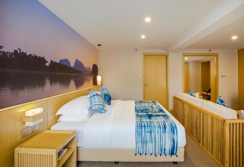 Отель Poltton Service Apartment Yangshuo Wubu Town