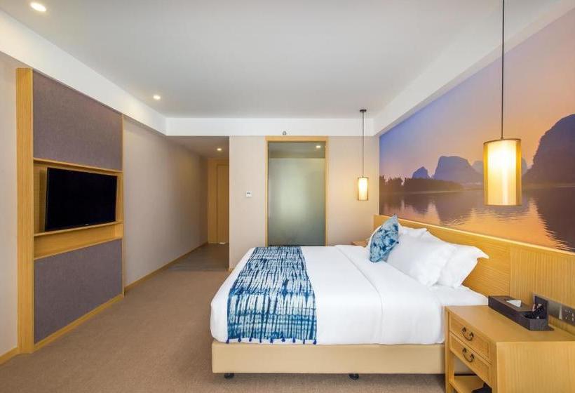 Отель Poltton Service Apartment Yangshuo Wubu Town