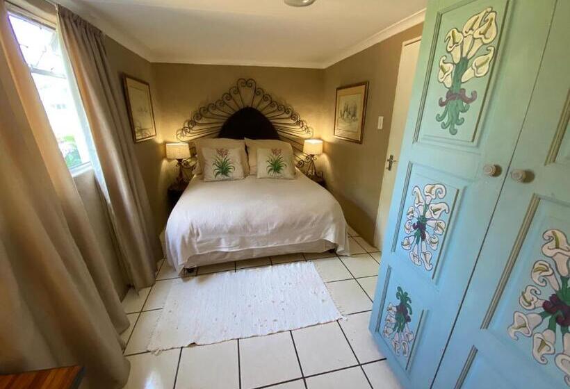 بنسيون Bohemian Garden Cottages