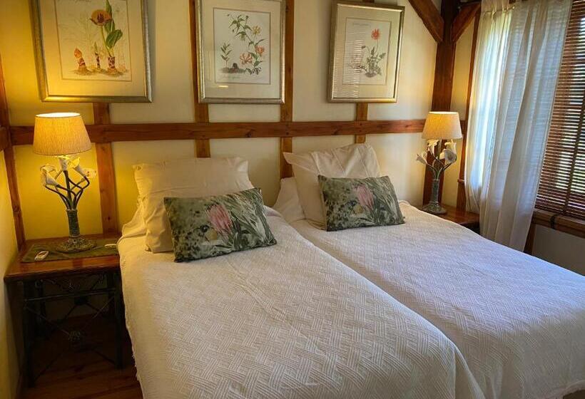 بنسيون Bohemian Garden Cottages