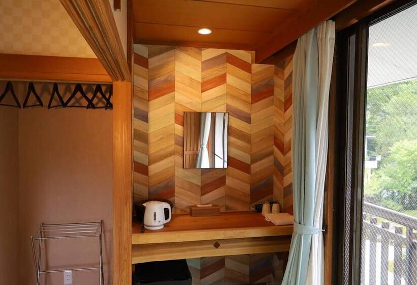 ペンション Onsen & Garden Asante Inn