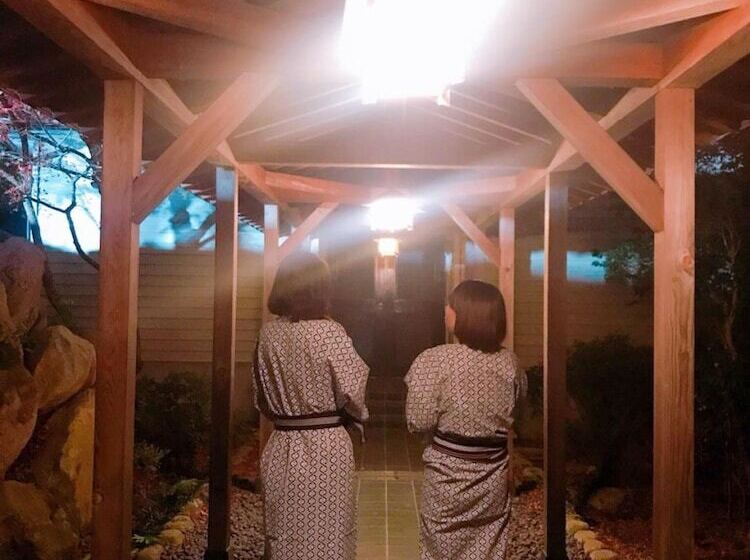 ペンション Onsen & Garden Asante Inn