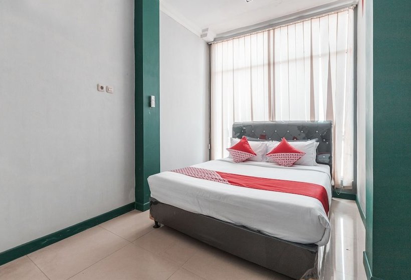 Отель Puspita Guesthouse By Oyo Rooms