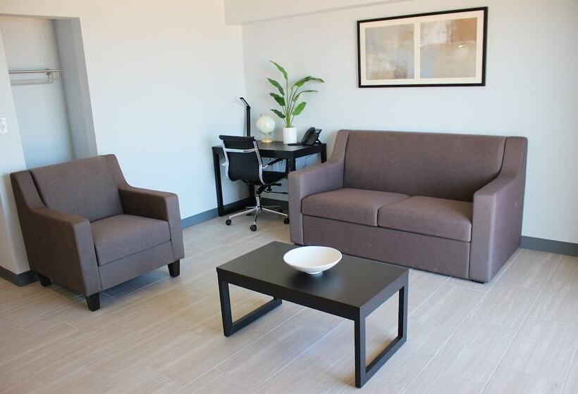 هتل Sun & Sand Resort Oceanfront Suites