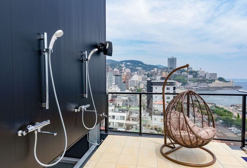 Отель Livemax Resort Atamiseafront