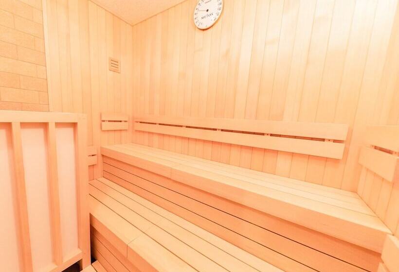 Отель Livemax Resort Atamiseafront