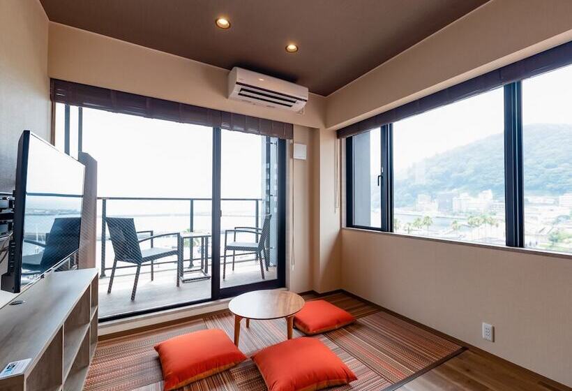 Отель Livemax Resort Atamiseafront