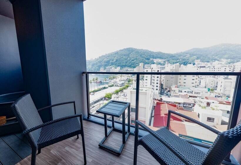 Отель Livemax Resort Atamiseafront