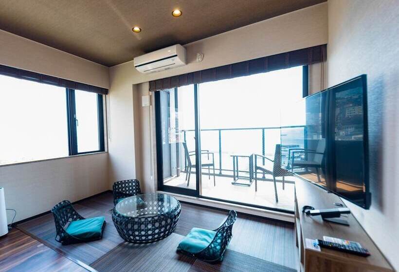 Отель Livemax Resort Atamiseafront