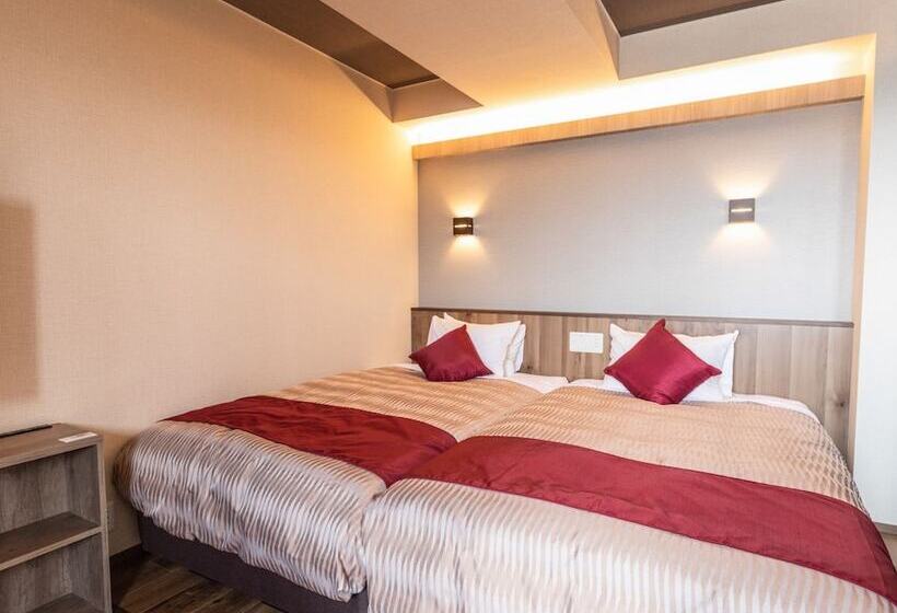 Отель Livemax Resort Atamiseafront