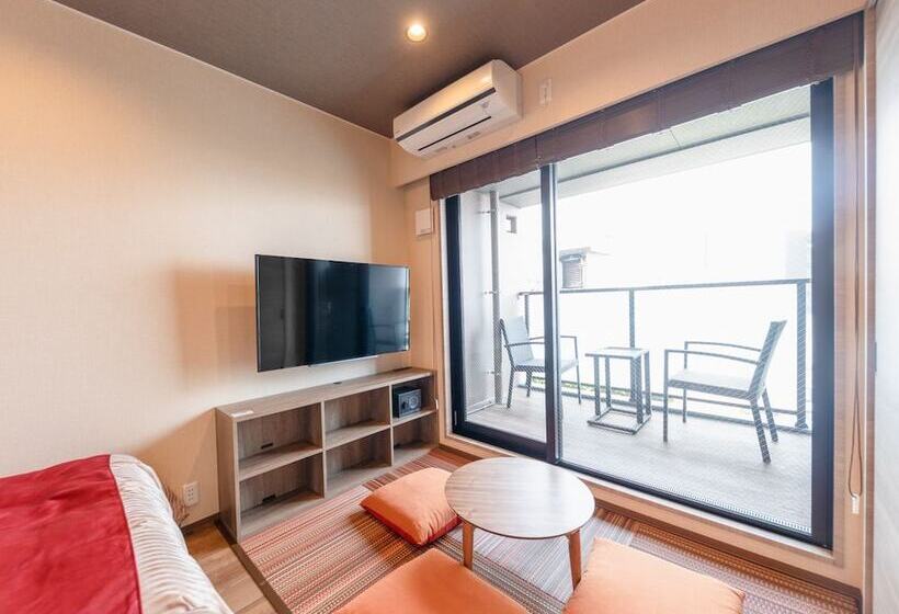 Отель Livemax Resort Atamiseafront