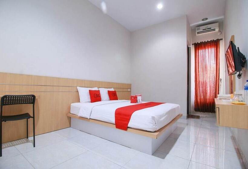 Отель Reddoorz Syariah Near Universitas Jenderal Soedirman