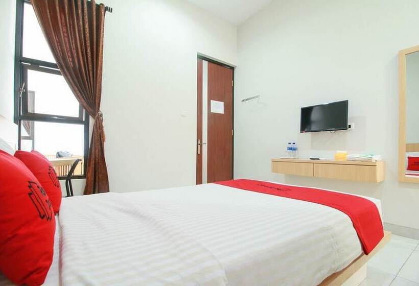Отель Reddoorz Syariah Near Universitas Jenderal Soedirman