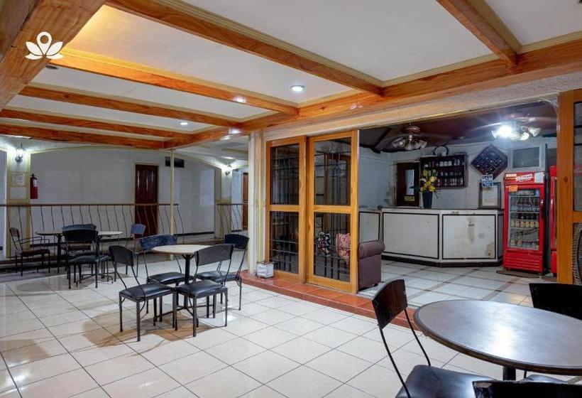 Отель Zen Rooms Basic Mercenary Inn