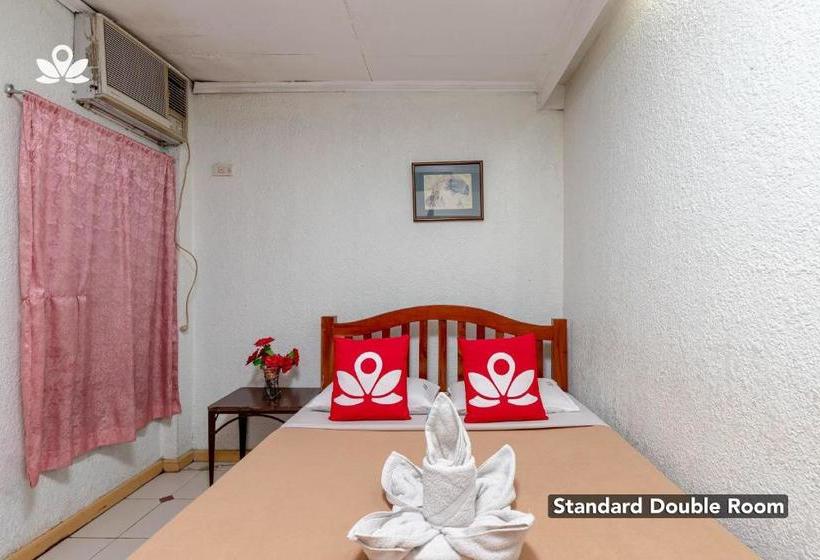 Отель Zen Rooms Basic Mercenary Inn