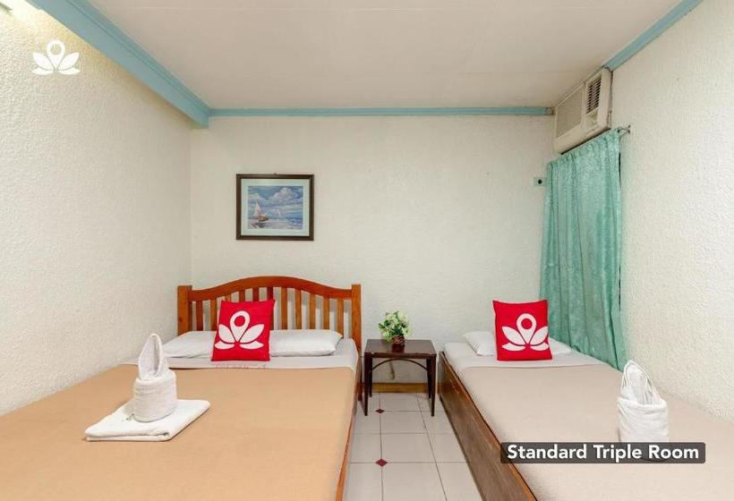 Отель Zen Rooms Basic Mercenary Inn