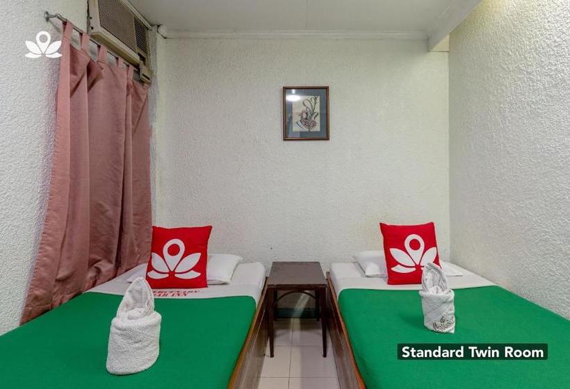 Отель Zen Rooms Basic Mercenary Inn