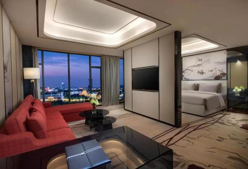 فندق Ramada By Wyndham Mengzi Suites