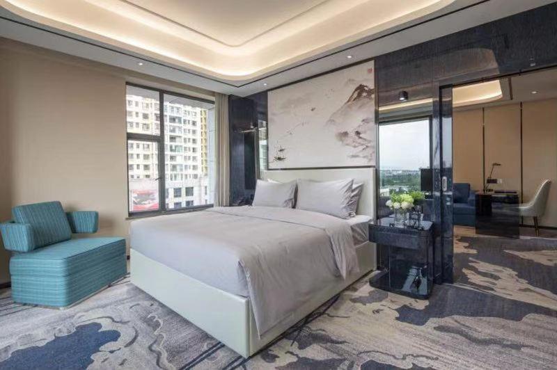 호텔 Ramada By Wyndham Mengzi Suites