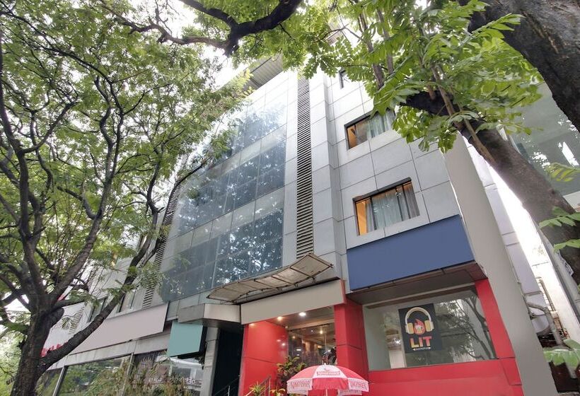 Capital O Elegant Amethyst Business Hotel Near Ragigudda Sri Prasanna Anjaneyaswamy Temple