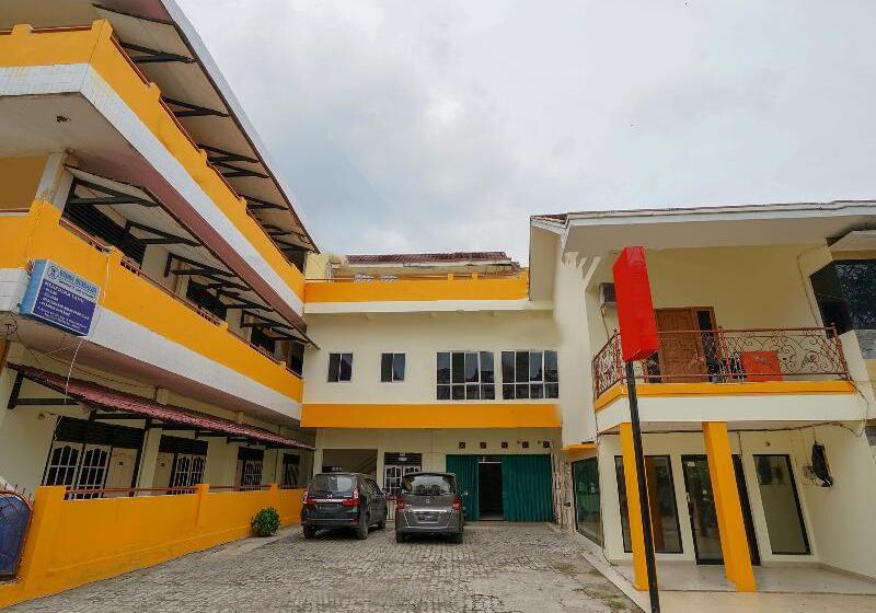 Отель Oyo 2025 Wisma Musdalifa