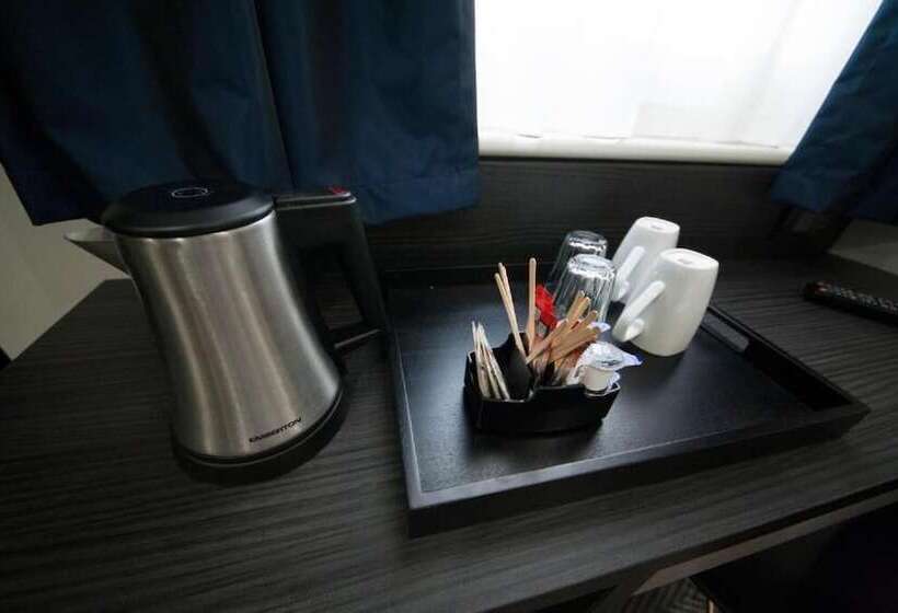 Отель The Pack And Carriage London