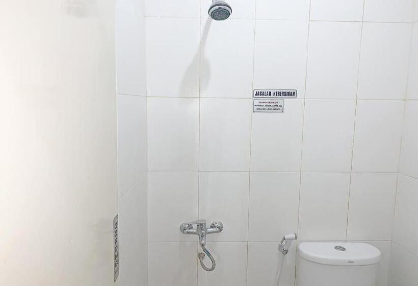 Отель Reddoorz Syariah Near Jam Gadang Bukittinggi 2