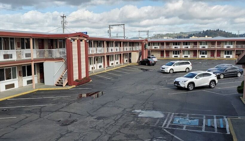 Отель Olympic Inn & Suites