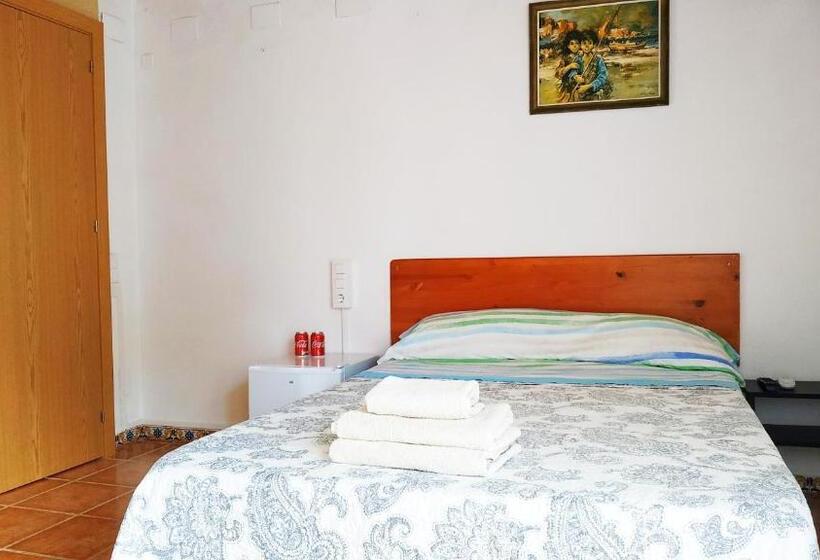 Golden Tower Pensión Auto Check In