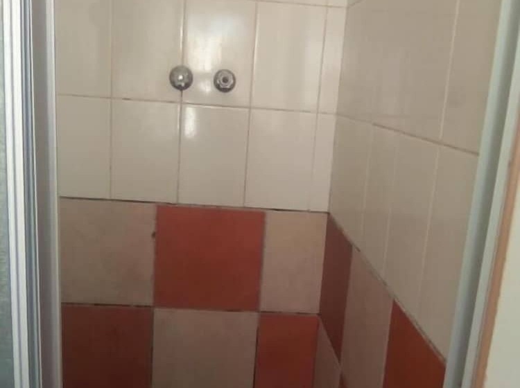 פנסיון Eleventh Avenue Guesthouse & Conferencing