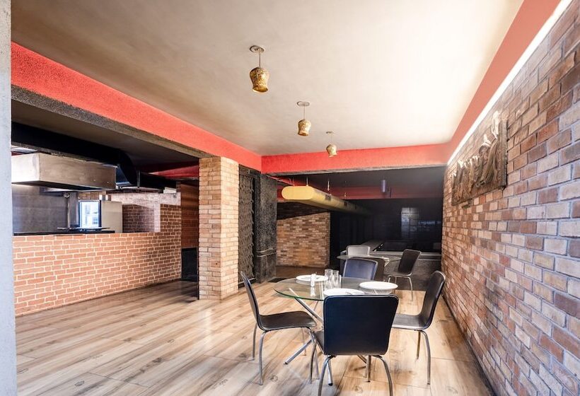 בית מלון כפרי Treebo Kings Orchid