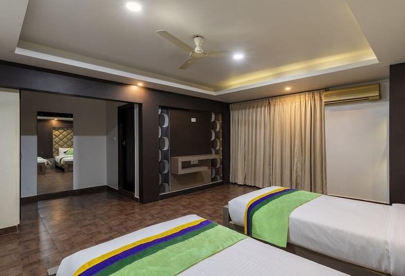 בית מלון כפרי Treebo Kings Orchid