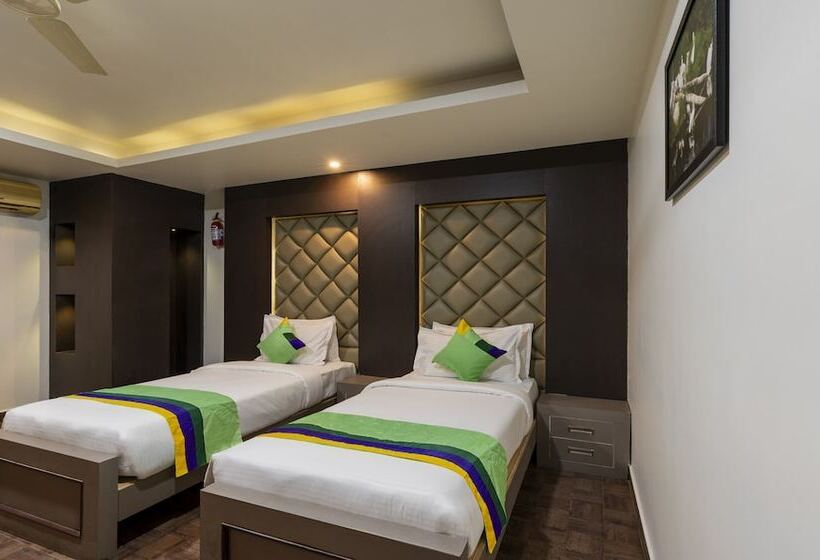 בית מלון כפרי Treebo Kings Orchid