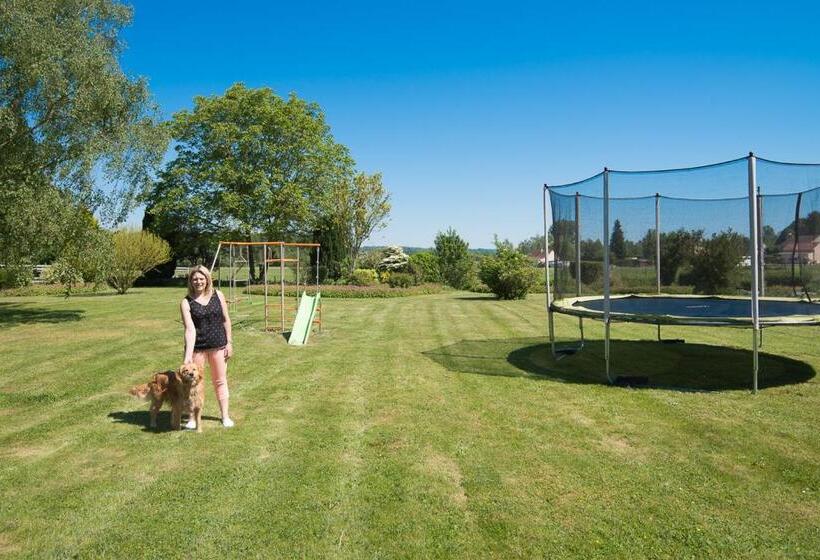 فندق Au Jardin Fleuri