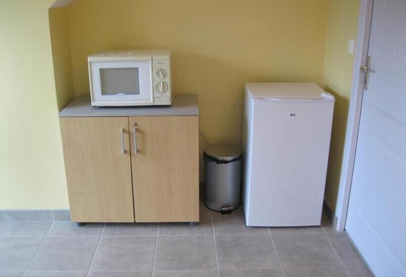 فندق Au Jardin Fleuri