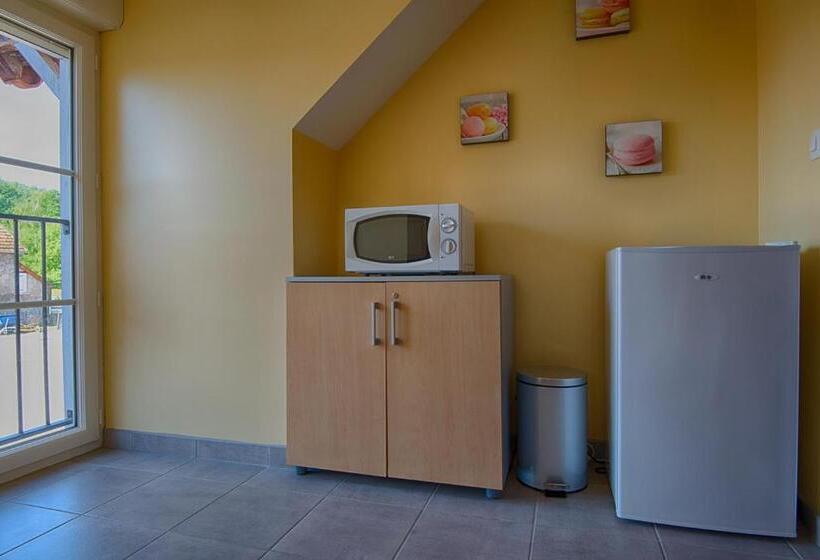 فندق Au Jardin Fleuri